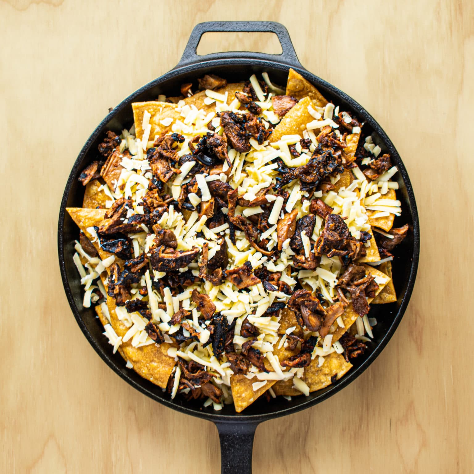 Layer chips, cheese, and mushroom meat