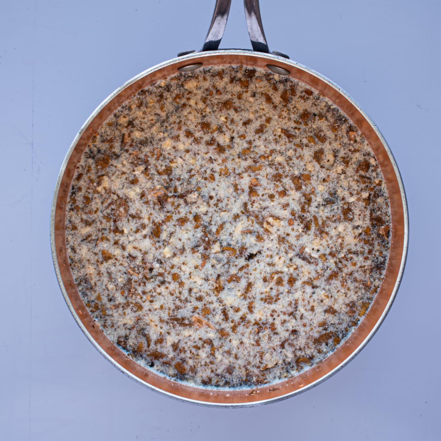 Place the nuts and water in a pot